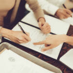 People working on divorce papers