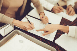 People working on divorce papers
